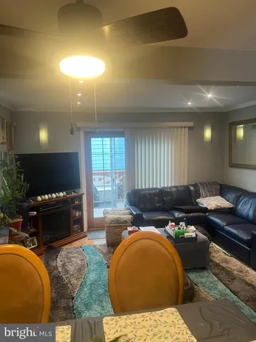 a living room with furniture and a couch