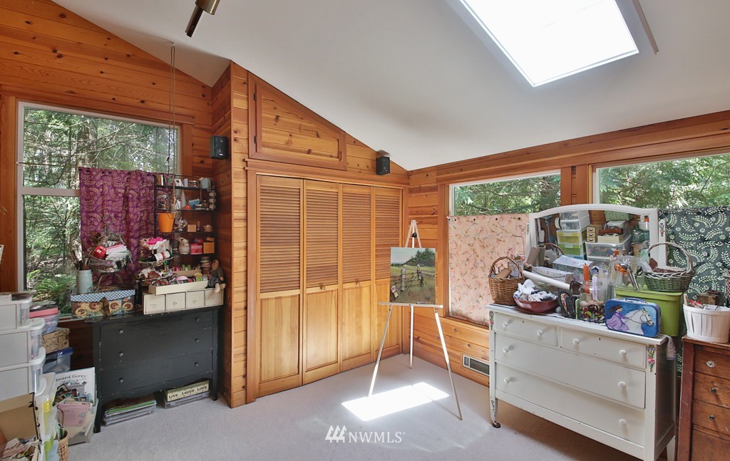 3608 East Harbor Road Langley, WA 98260 - Photo 14 of 25 a room with furniture and a window