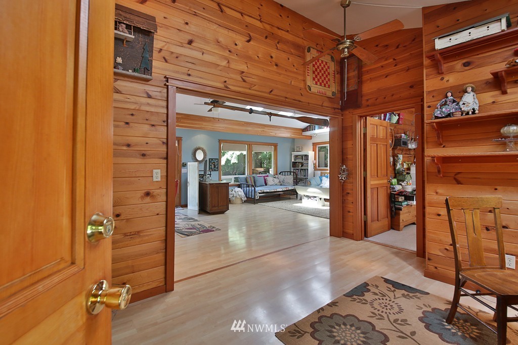 3608 East Harbor Road Langley, WA 98260 - Photo 4 of 25 a view of a hallway with dining area