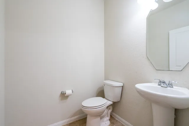 a bathroom with a sink and a toilet