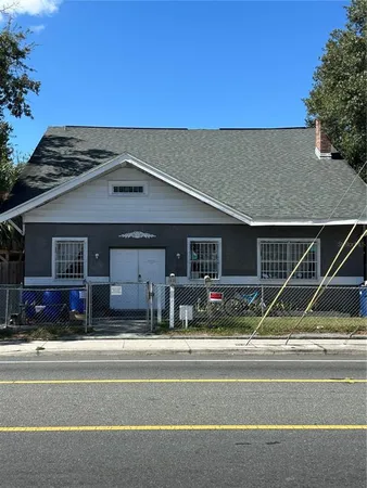 a view of house with outdoor space and street view
