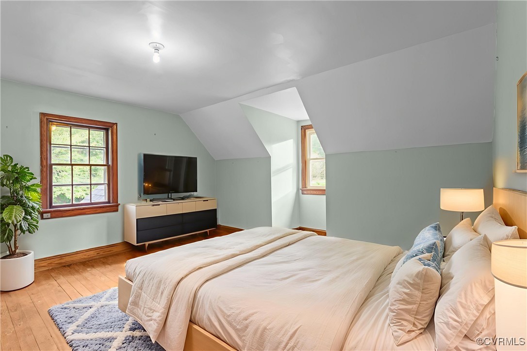 14831 Harrowgate Road Chester, VA 23831 - Photo 19 of 33 a bedroom with a bed and a television