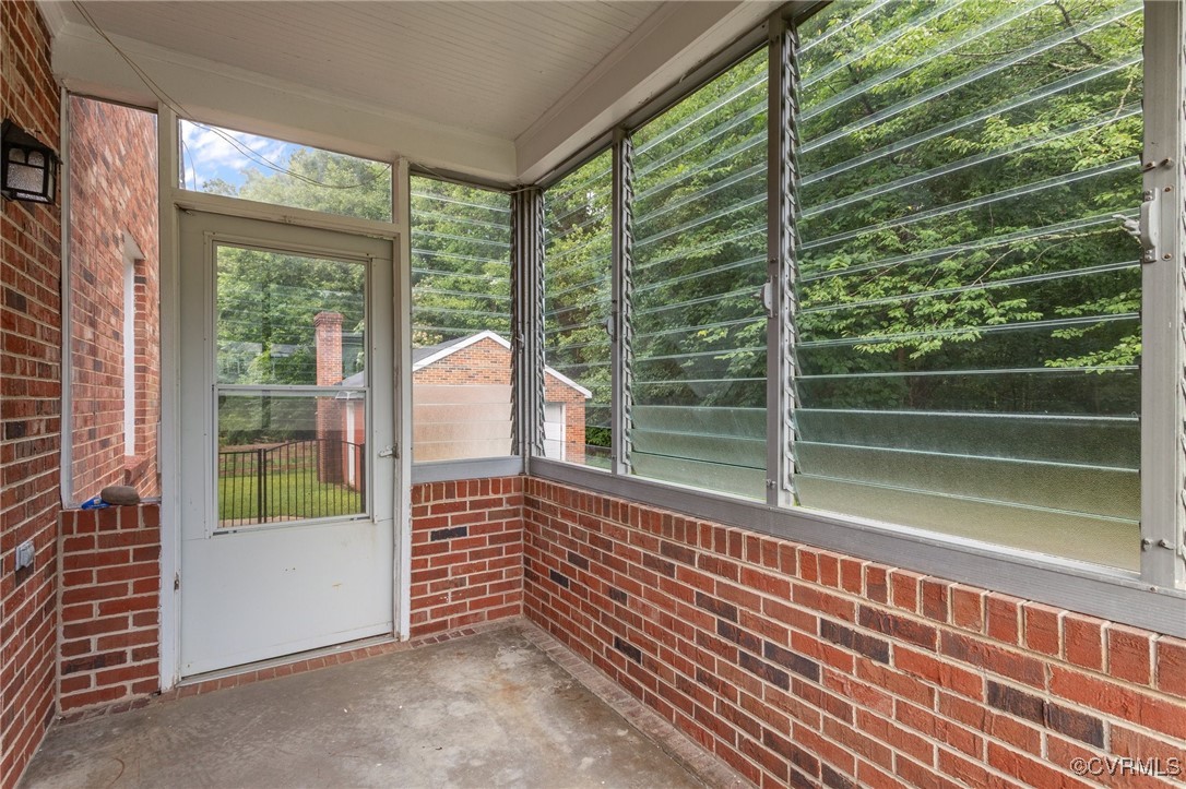 14831 Harrowgate Road Chester, VA 23831 - Photo 21 of 33 a view of a balcony with a tree