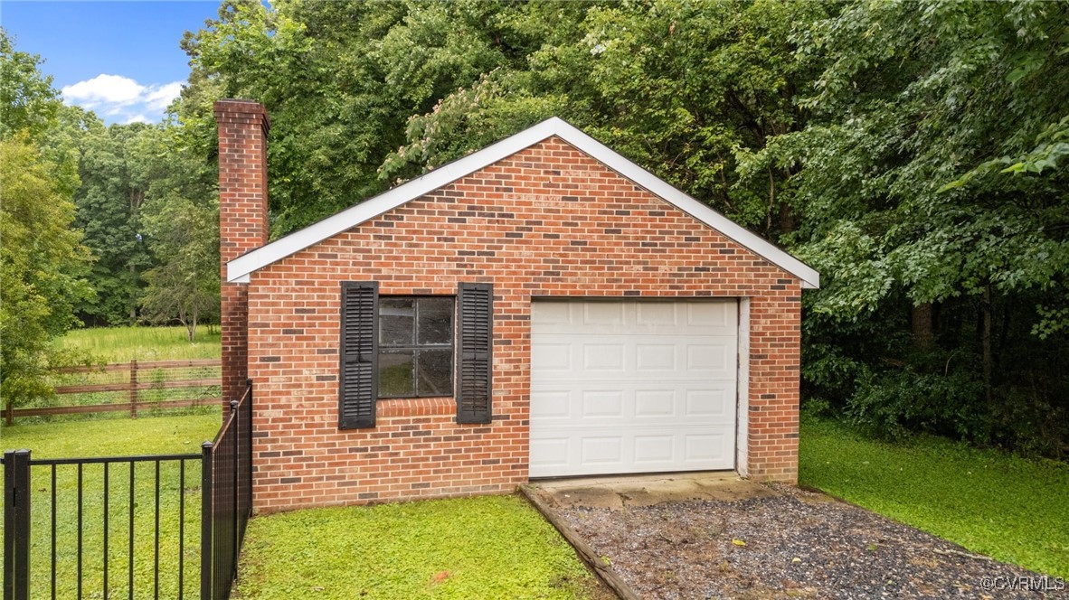 14831 Harrowgate Road Chester, VA 23831 - Photo 27 of 33 a view of front of house with a yard