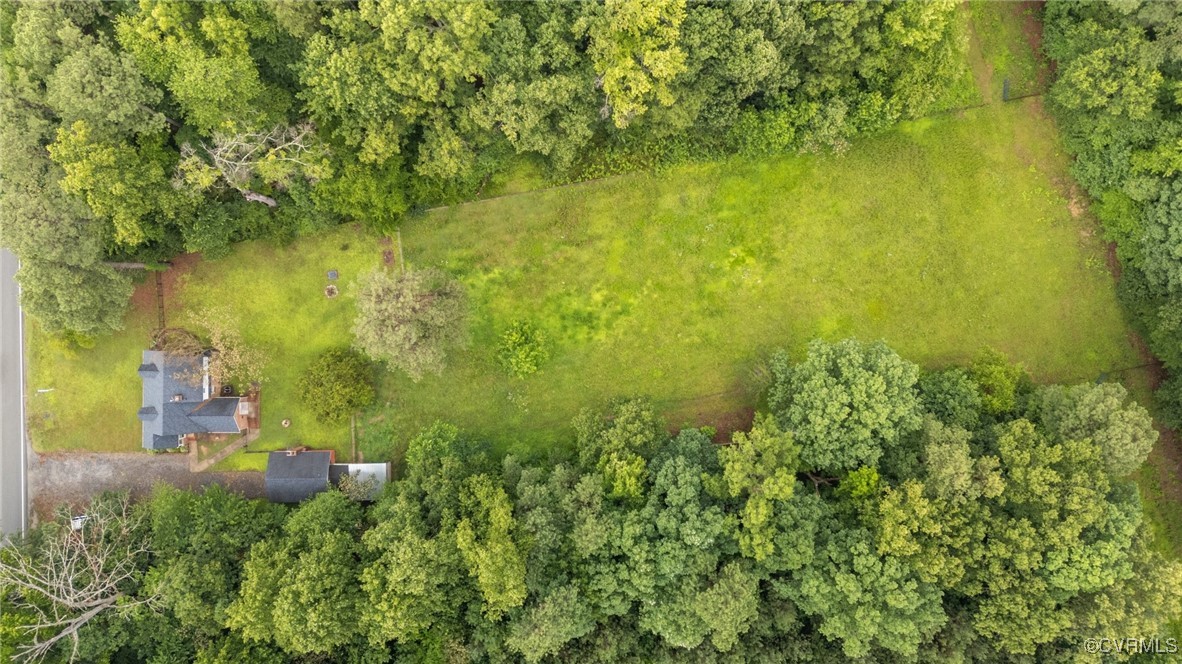 14831 Harrowgate Road Chester, VA 23831 - Photo 29 of 33 a view of a lake with a house
