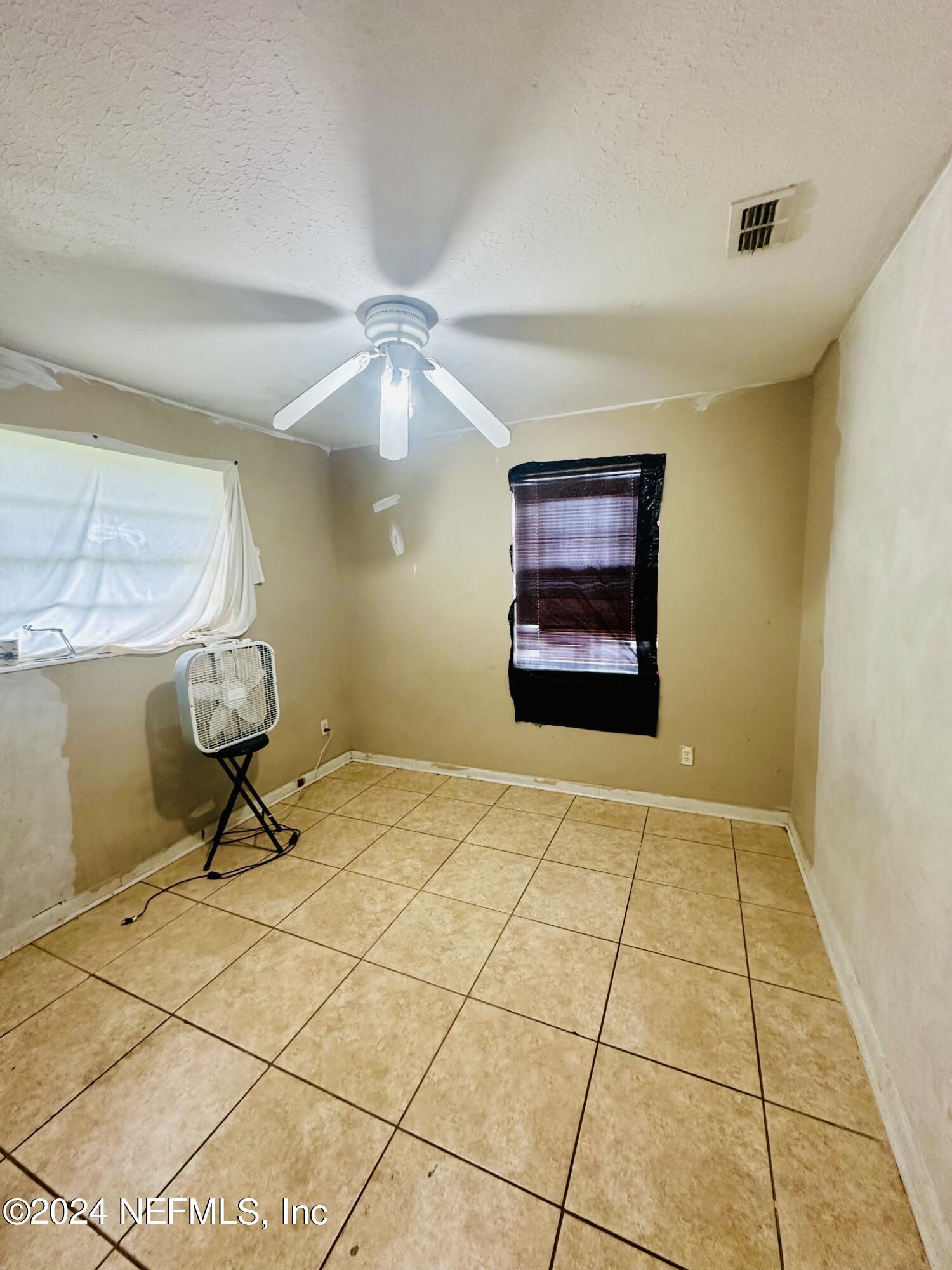 5521 Sabena Road Jacksonville, FL 32207 - Photo 8 of 13 a view of an empty room