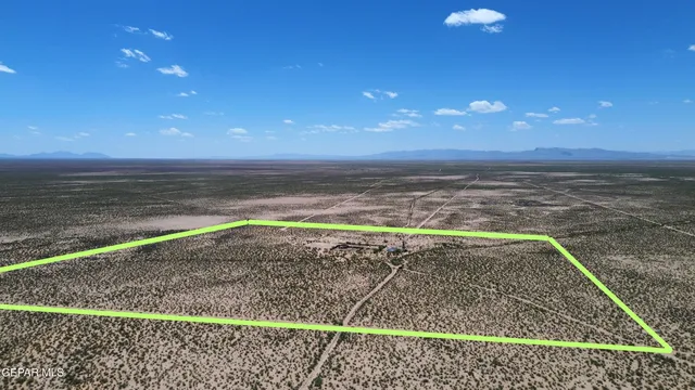 a view of outdoor space with wooden floor