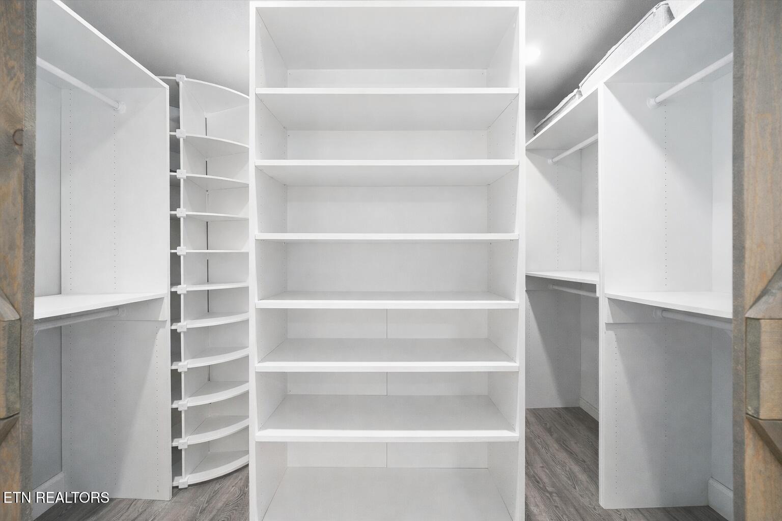 260 Rotherham Drive Crossville, TN 38558 - Photo 21 of 55 Empty walk-in closet with white shelves