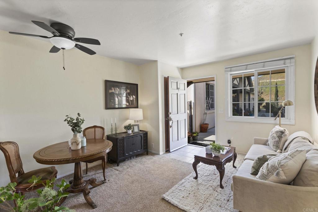 1160 Little Gopher Canyon Road Vista, CA 92084 - Photo 27 of 45 a living room with furniture and a potted plant