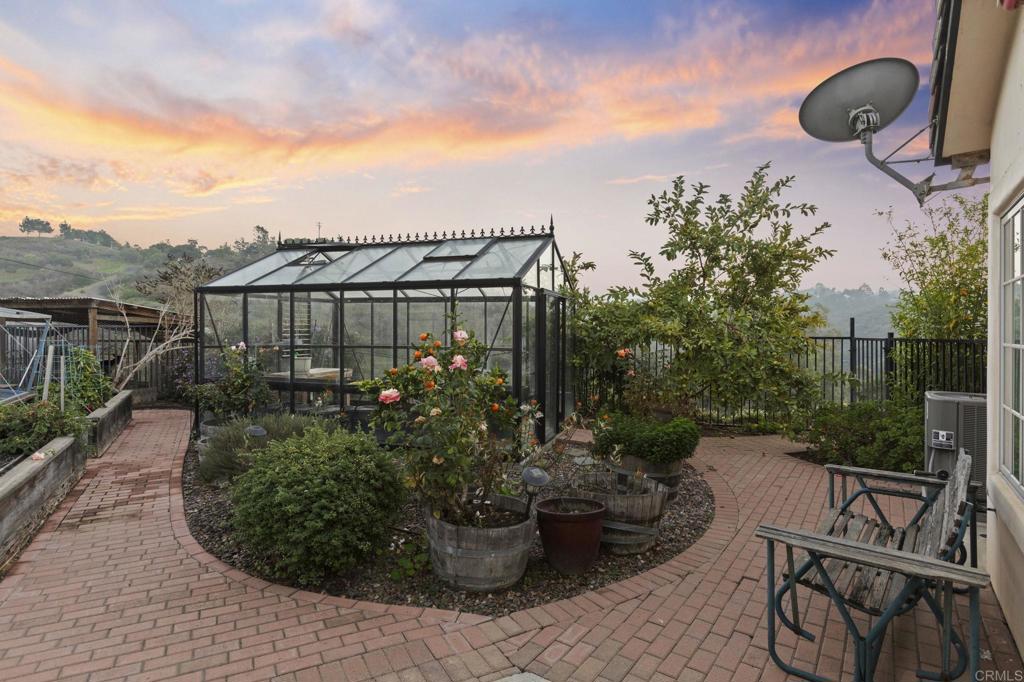 1160 Little Gopher Canyon Road Vista, CA 92084 - Photo 41 of 45 a view of a terrace with furniture and potted plants