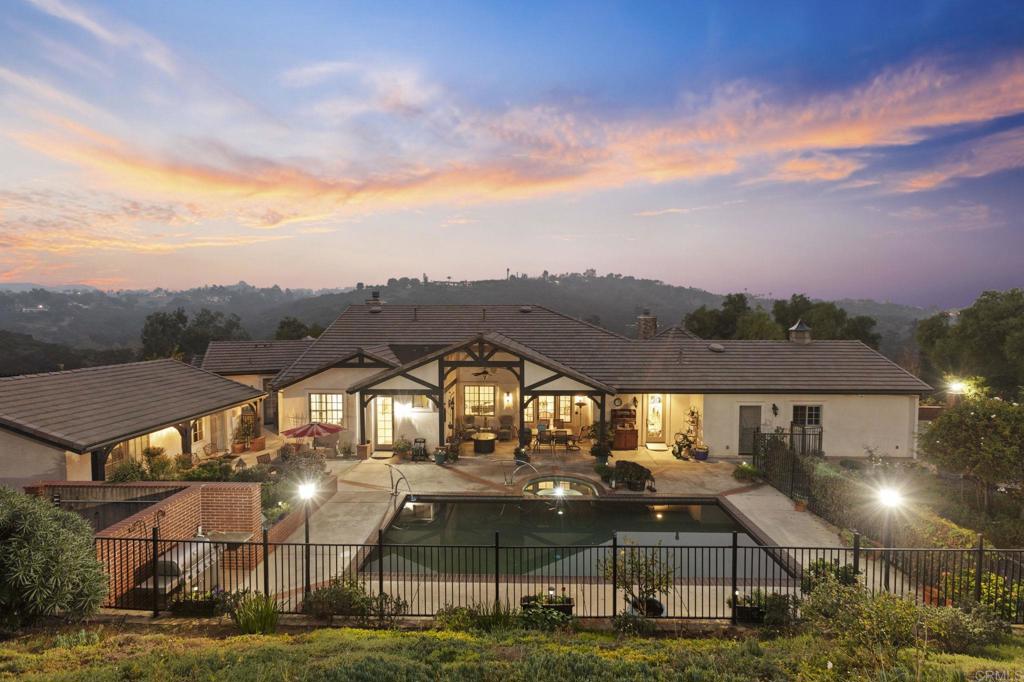 1160 Little Gopher Canyon Road Vista, CA 92084 - Photo 6 of 20 a view of residential houses with yard and mountain view in back