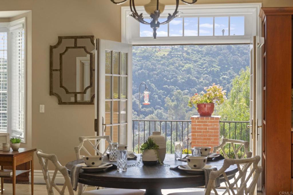 1160 Little Gopher Canyon Road Vista, CA 92084 - Photo 7 of 45 a view of a dining room with furniture and chandelier