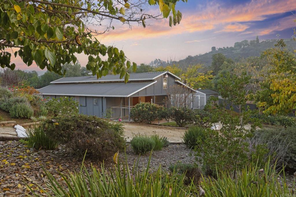 1160 Little Gopher Canyon Road Vista, CA 92084 - Photo 7 of 20 a front view of a house with a garden