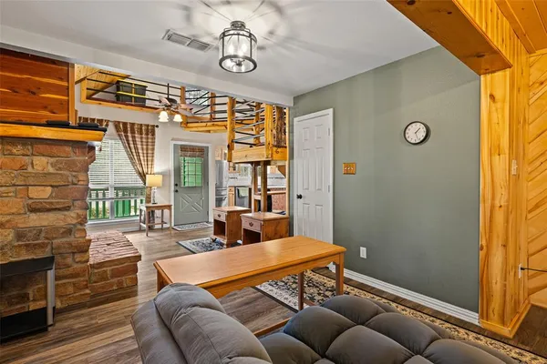 a bedroom with furniture and a window