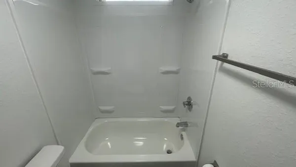 a close up of a bathtub in a bathroom