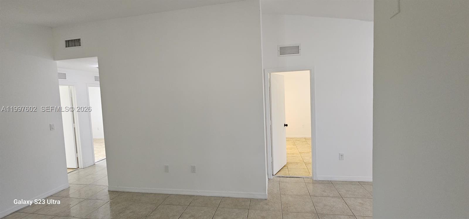 935 Northeast 33rd Terrace, Unit 204 Homestead, FL 33033 - Photo 26 of 28 a view of an empty room