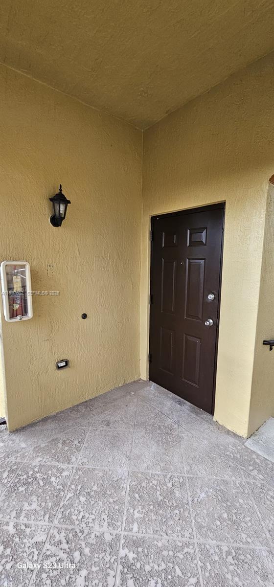 935 Northeast 33rd Terrace, Unit 204 Homestead, FL 33033 - Photo 4 of 28 a view of an empty room