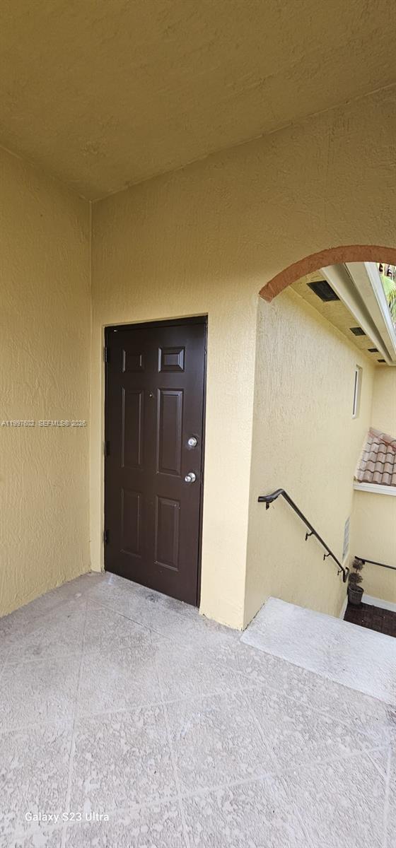 935 Northeast 33rd Terrace, Unit 204 Homestead, FL 33033 - Photo 6 of 28 a view of an empty room