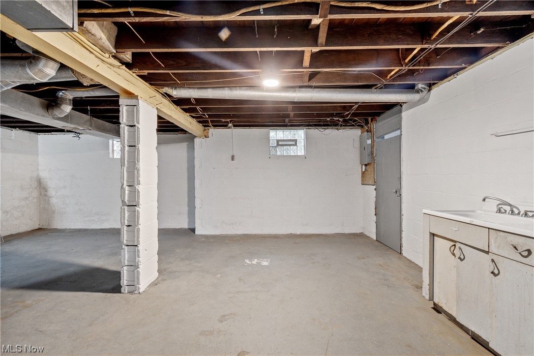 1529 Walnut Road Southwest Massillon, OH 44647 - Photo 22 of 27 Basement with sink