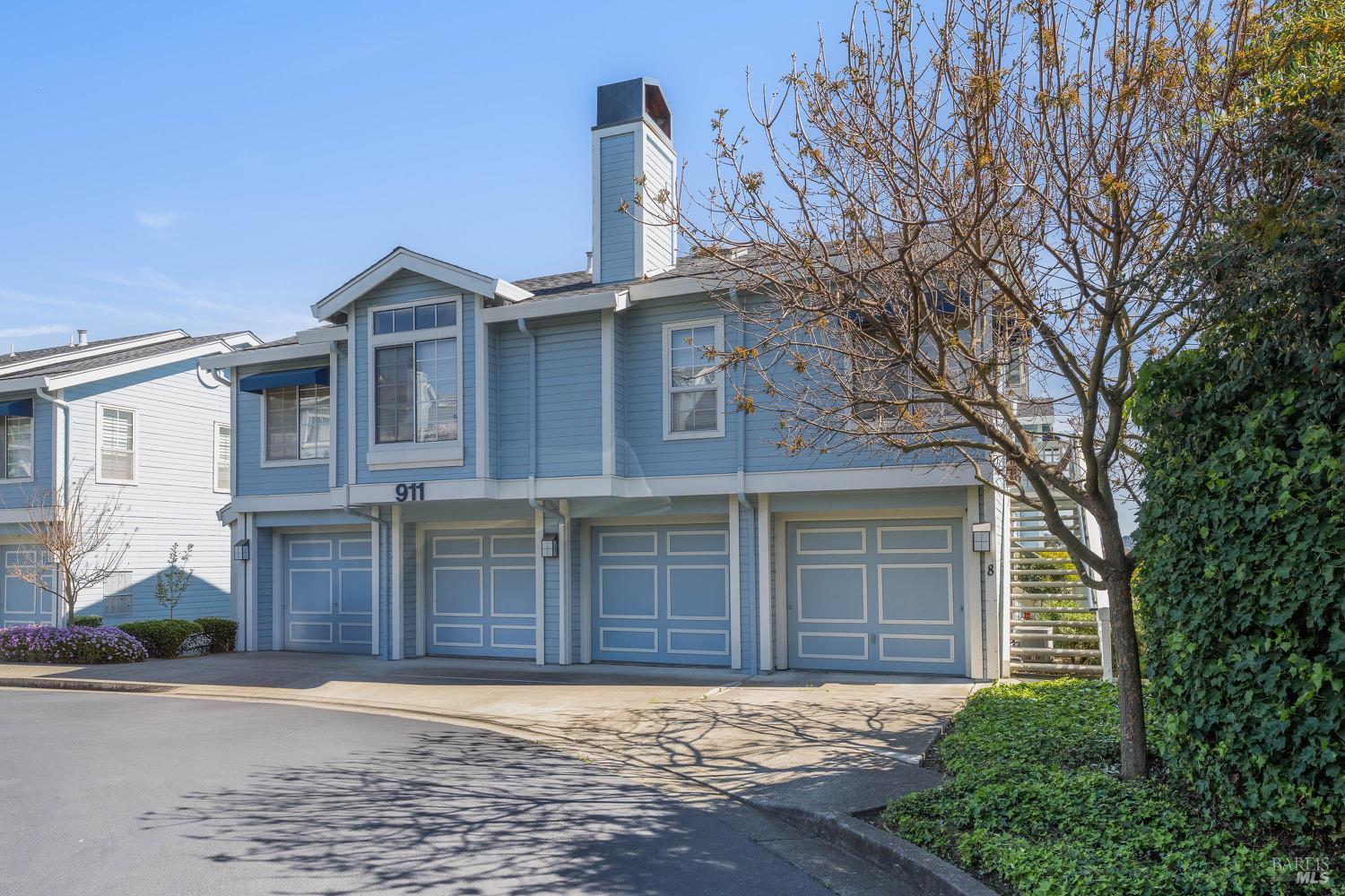 911 Point Reyes Court, Unit 6 Vallejo, CA 94591 - Photo 22 of 35 a front view of a house with a large tree