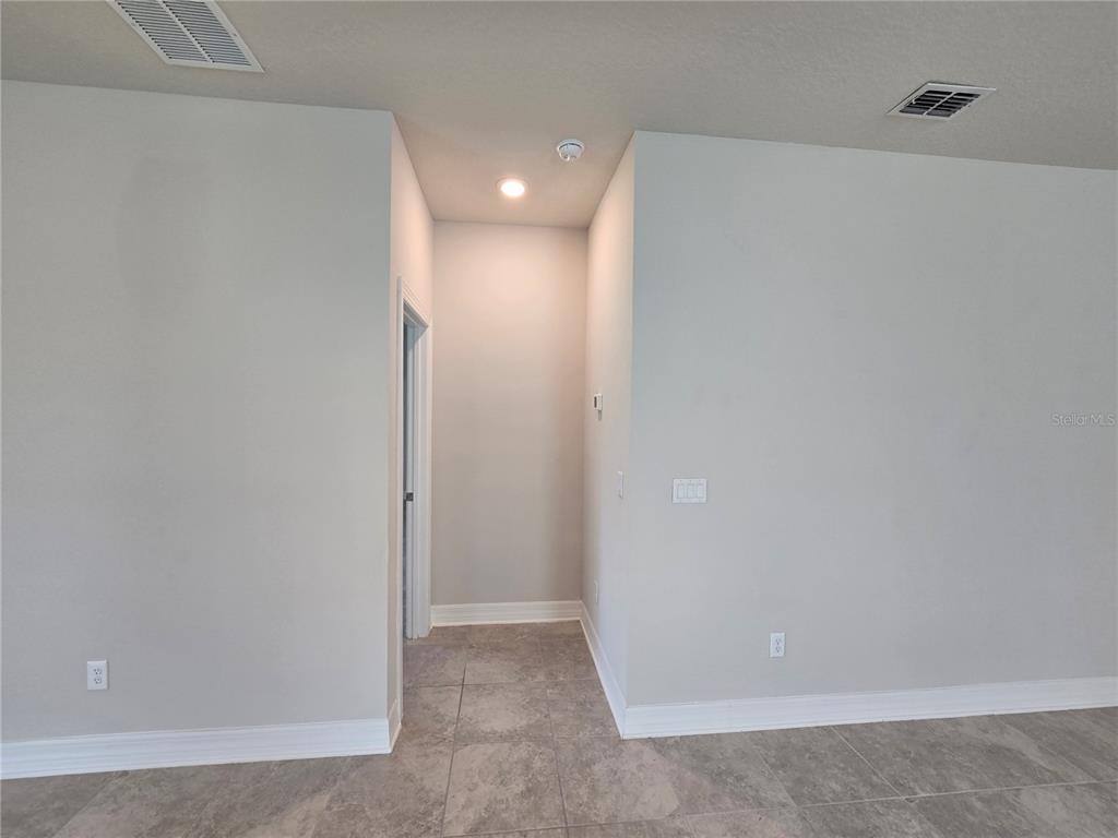 2136 Live Oak Lake Road St. Cloud, FL 34771 - Photo 13 of 42 a view of an empty room