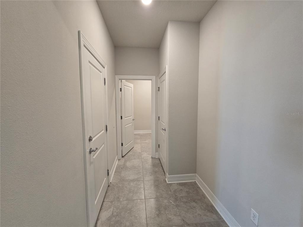 2136 Live Oak Lake Road St. Cloud, FL 34771 - Photo 30 of 42 a view of a hallway