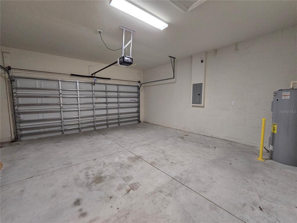 2136 Live Oak Lake Road St. Cloud, FL 34771 - Photo 34 of 42 a view of a garage