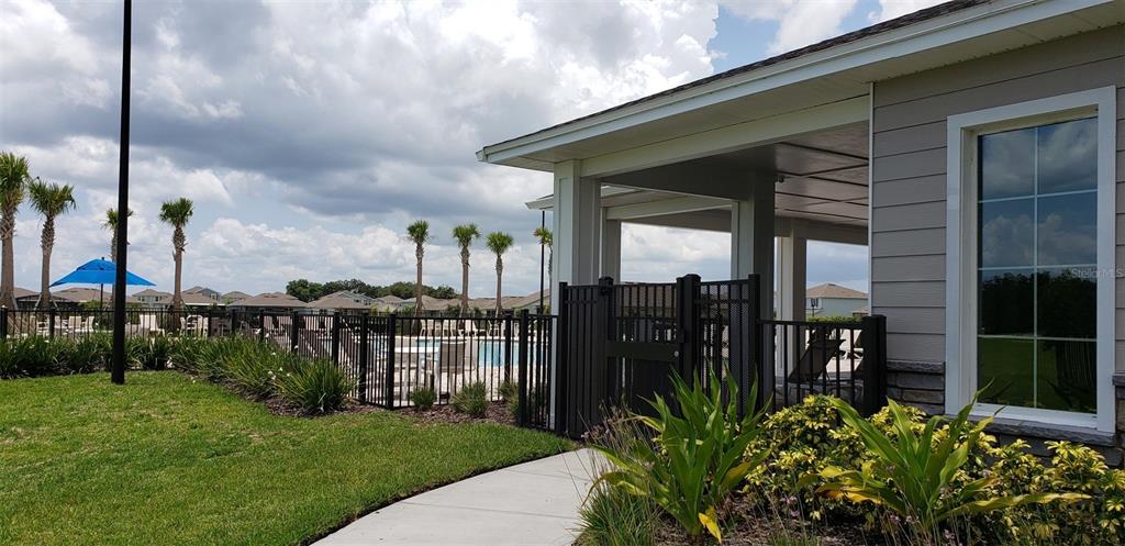 2136 Live Oak Lake Road St. Cloud, FL 34771 - Photo 38 of 42 a view of a garden from a balcony