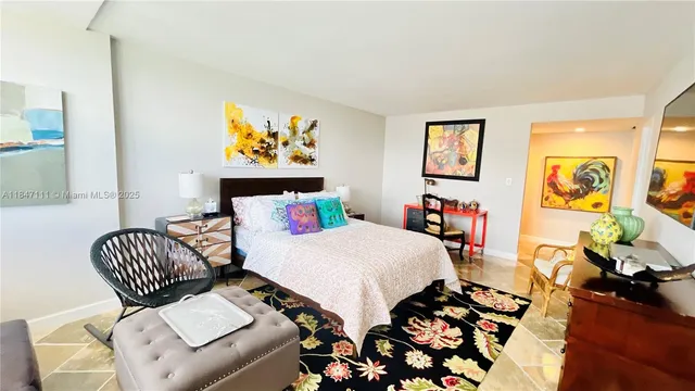 a living room with furniture a window and gym equipment
