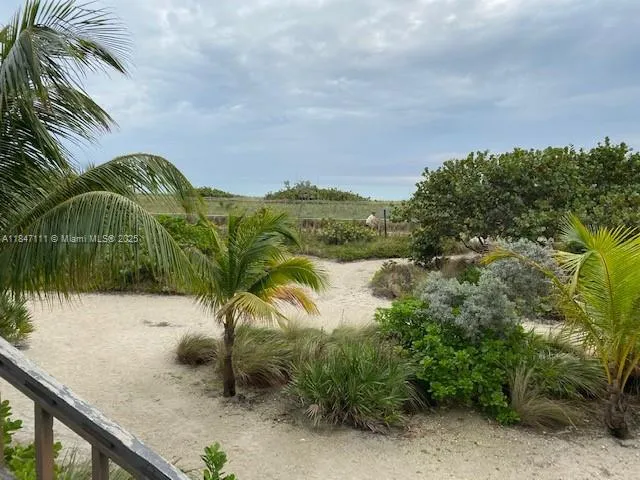 a view of a lake with a big yard