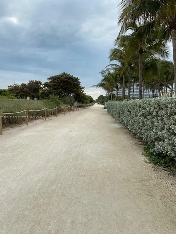 a view of a chair and table in the ocean