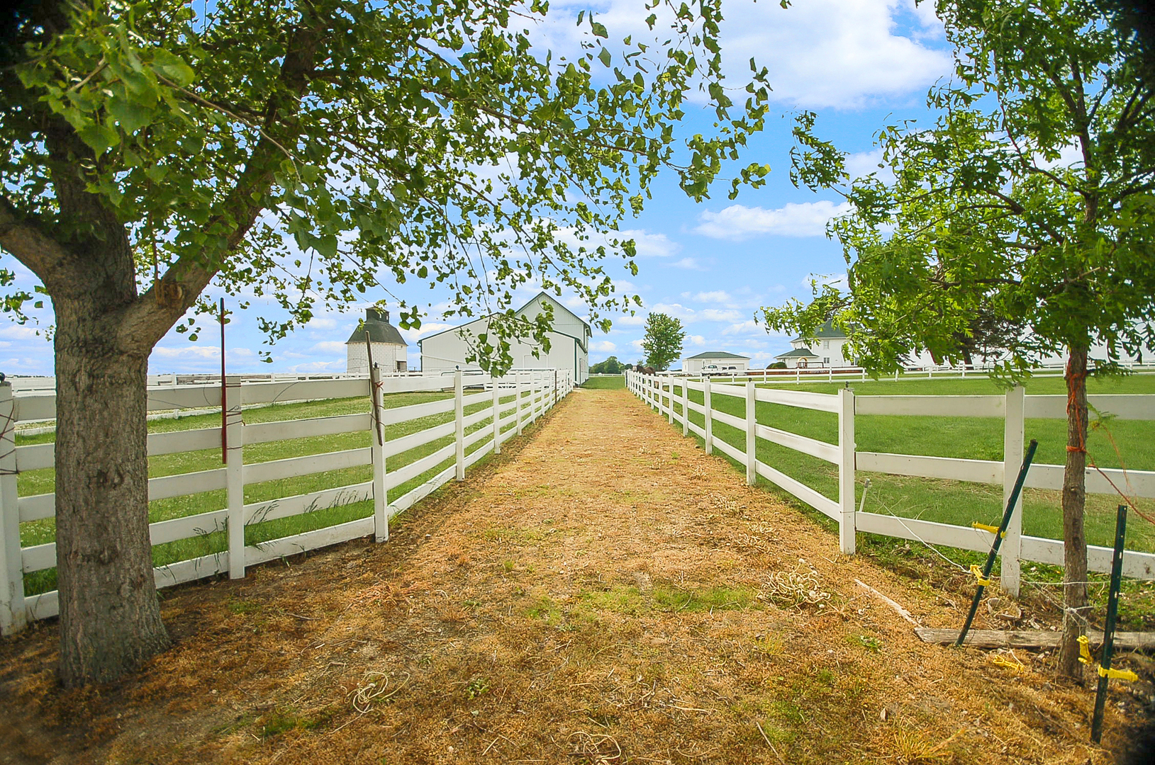 15742 Perry Road Hinckley, IL 60520 - Photo 40 of 73 a view of a yard with wooden fence