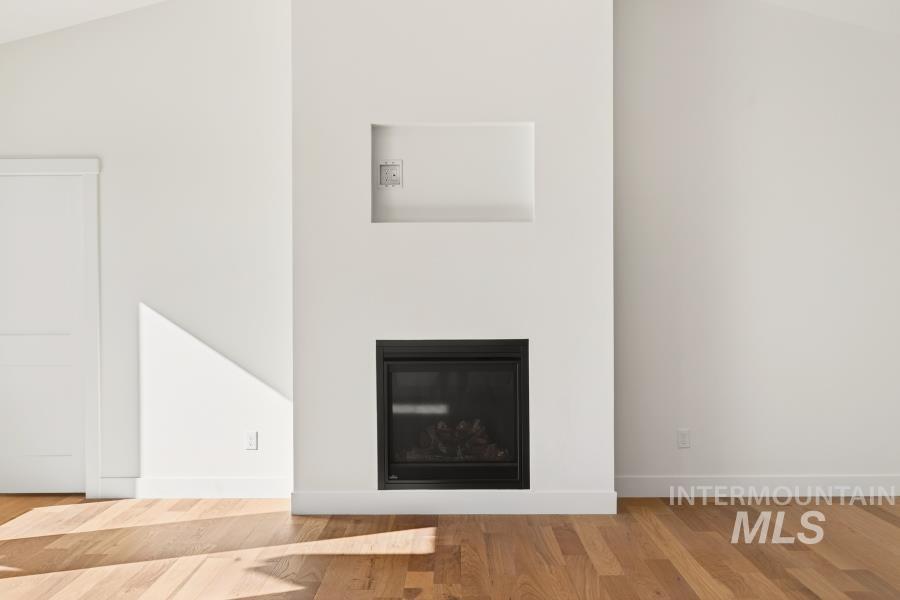 780 Victoria Drive Moscow, ID 83843 - Photo 19 of 44 Detailed view of a glass covered fireplace and wood finished floors