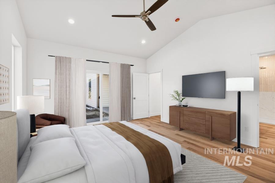 780 Victoria Drive Moscow, ID 83843 - Photo 21 of 44 Bedroom with vaulted ceiling, light wood finished floors, access to exterior, recessed lighting, and a ceiling fan