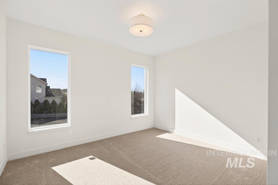 780 Victoria Drive Moscow, ID 83843 - Photo 35 of 44 Spare room with carpet flooring and baseboards