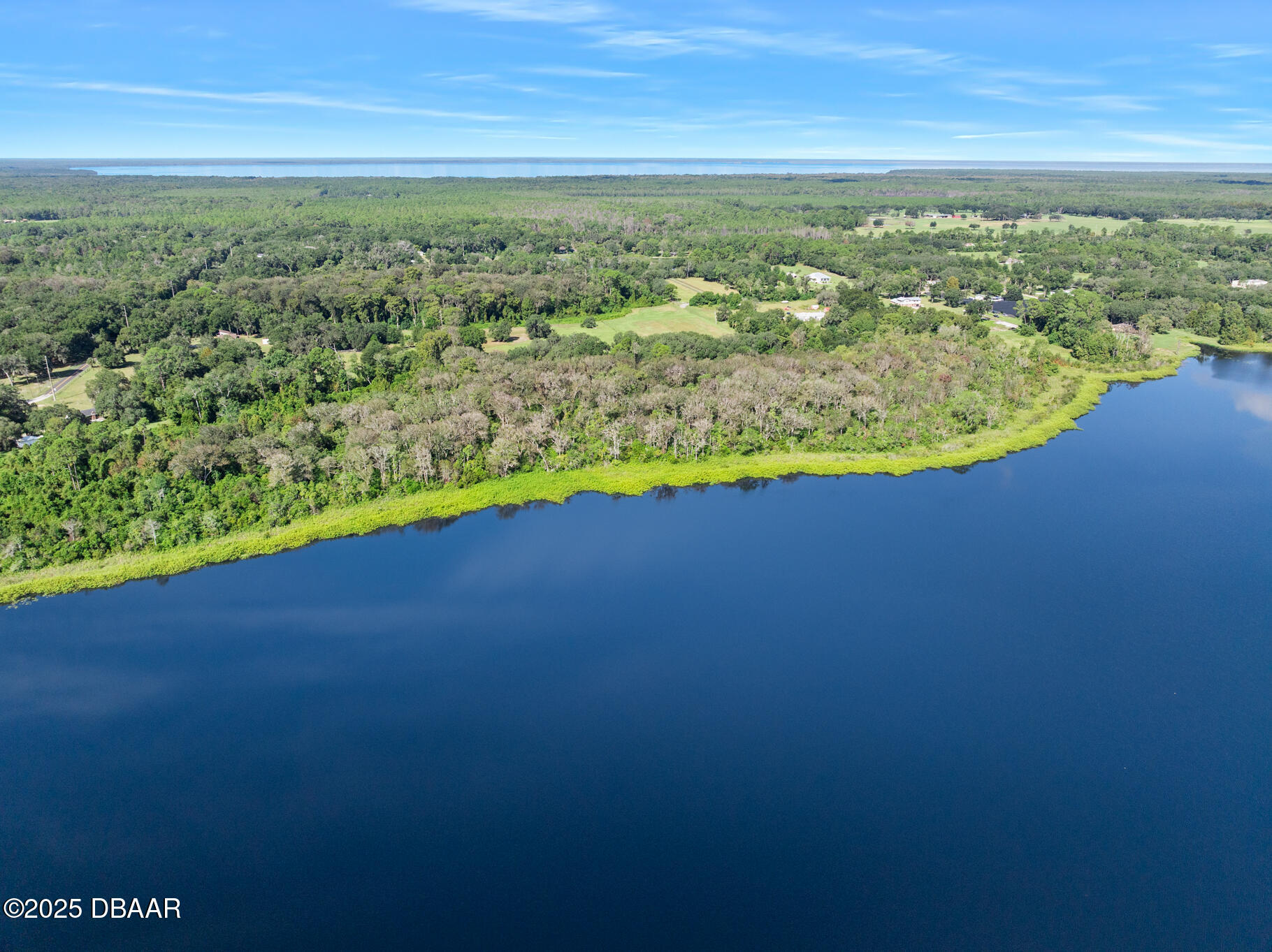 0 Roberts Road Pierson, FL 32180 - Photo 12 of 37 a view of a lake with a mountain