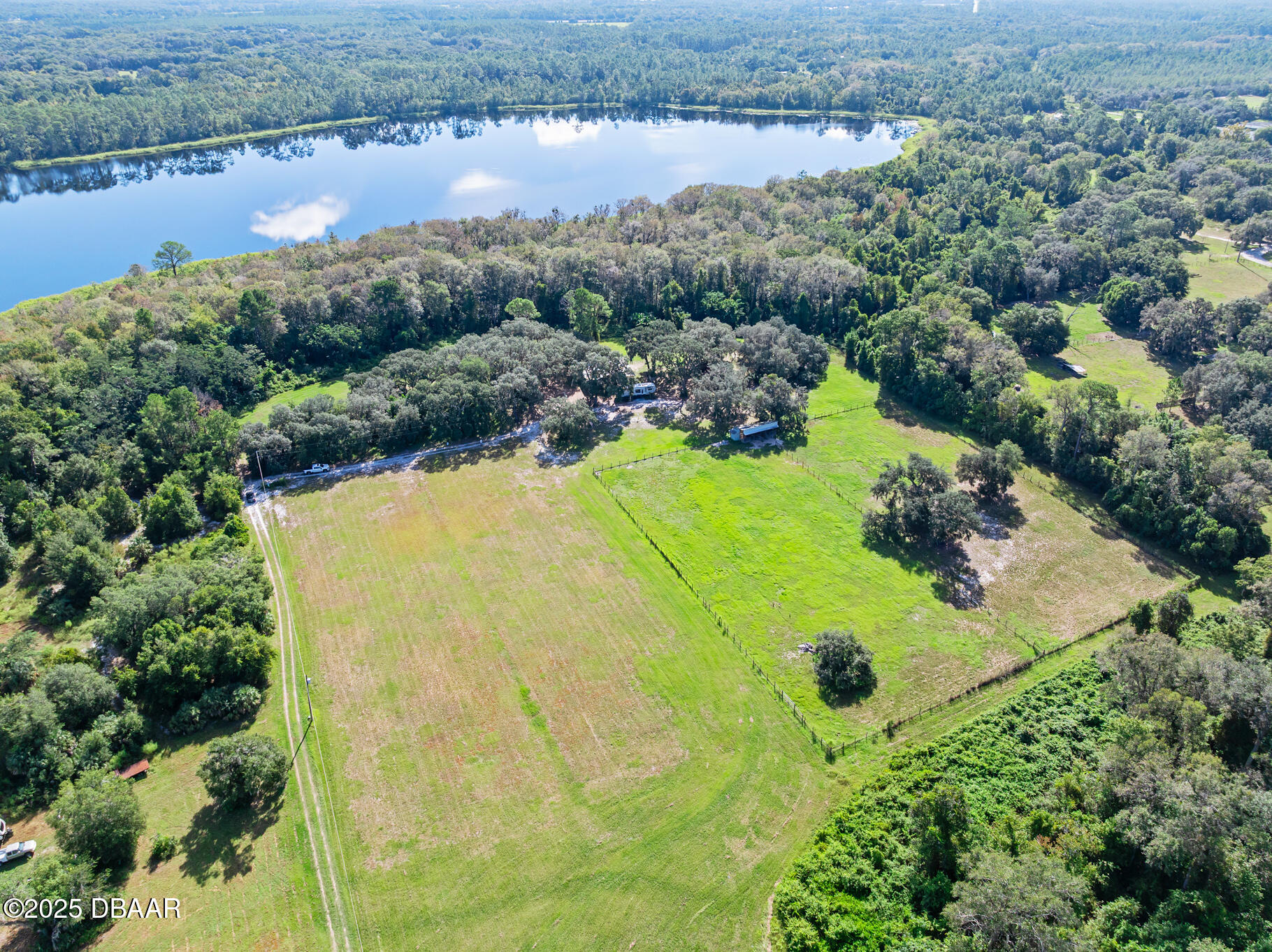 0 Roberts Road Pierson, FL 32180 - Photo 17 of 37 an aerial view of a residential houses with outdoor space and lake view