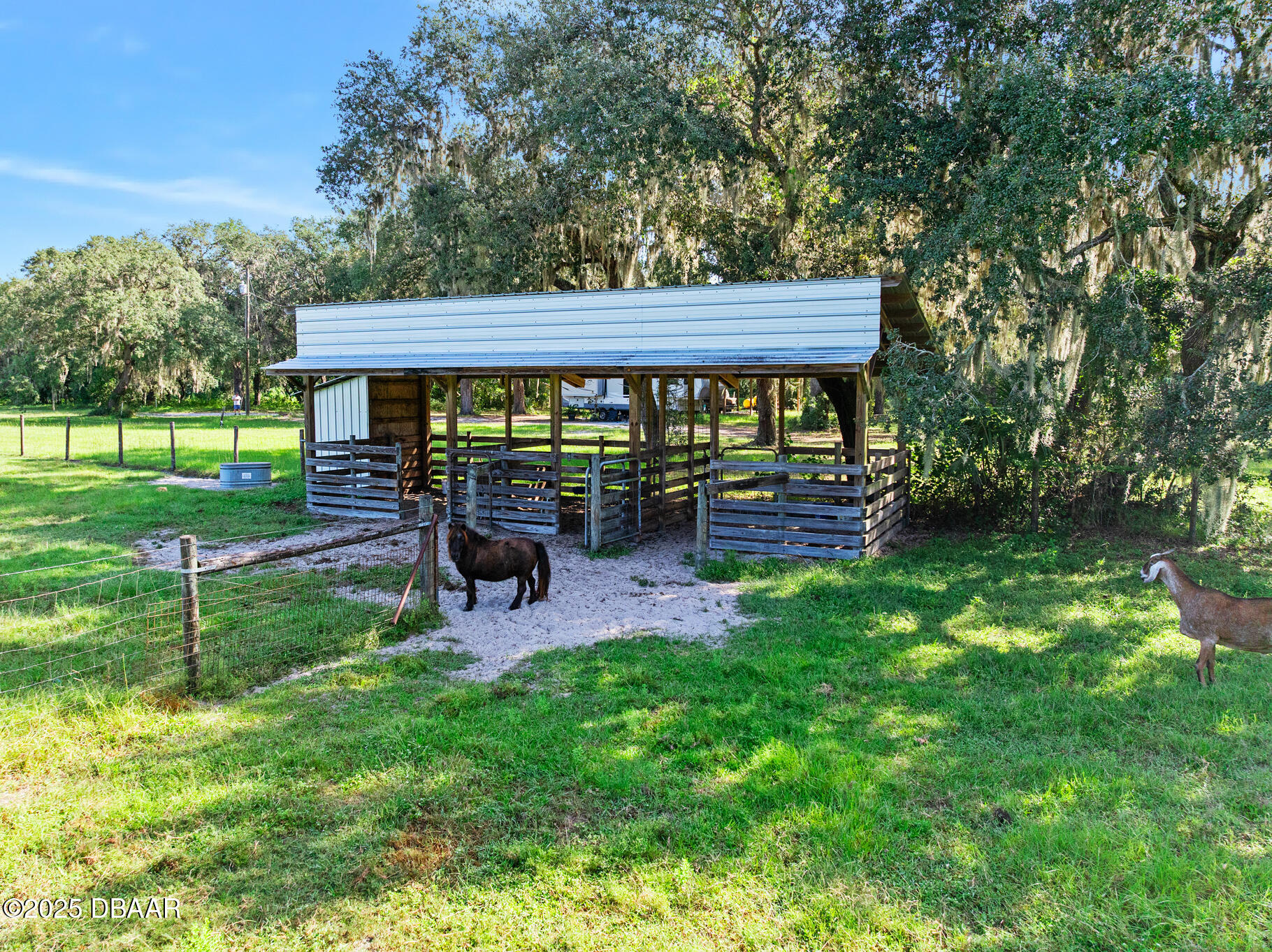0 Roberts Road Pierson, FL 32180 - Photo 29 of 37 a view of a backyard with table and chairs with a yard