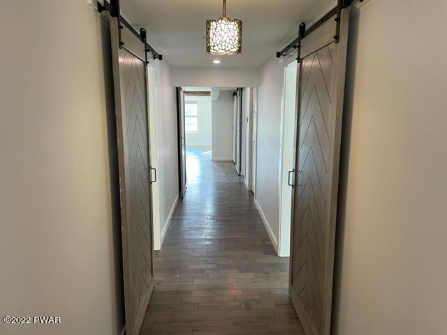 2 Hudson Street Hawley, PA 18428 - Photo 9 of 43 a view of a hallway with wooden floor and entryway