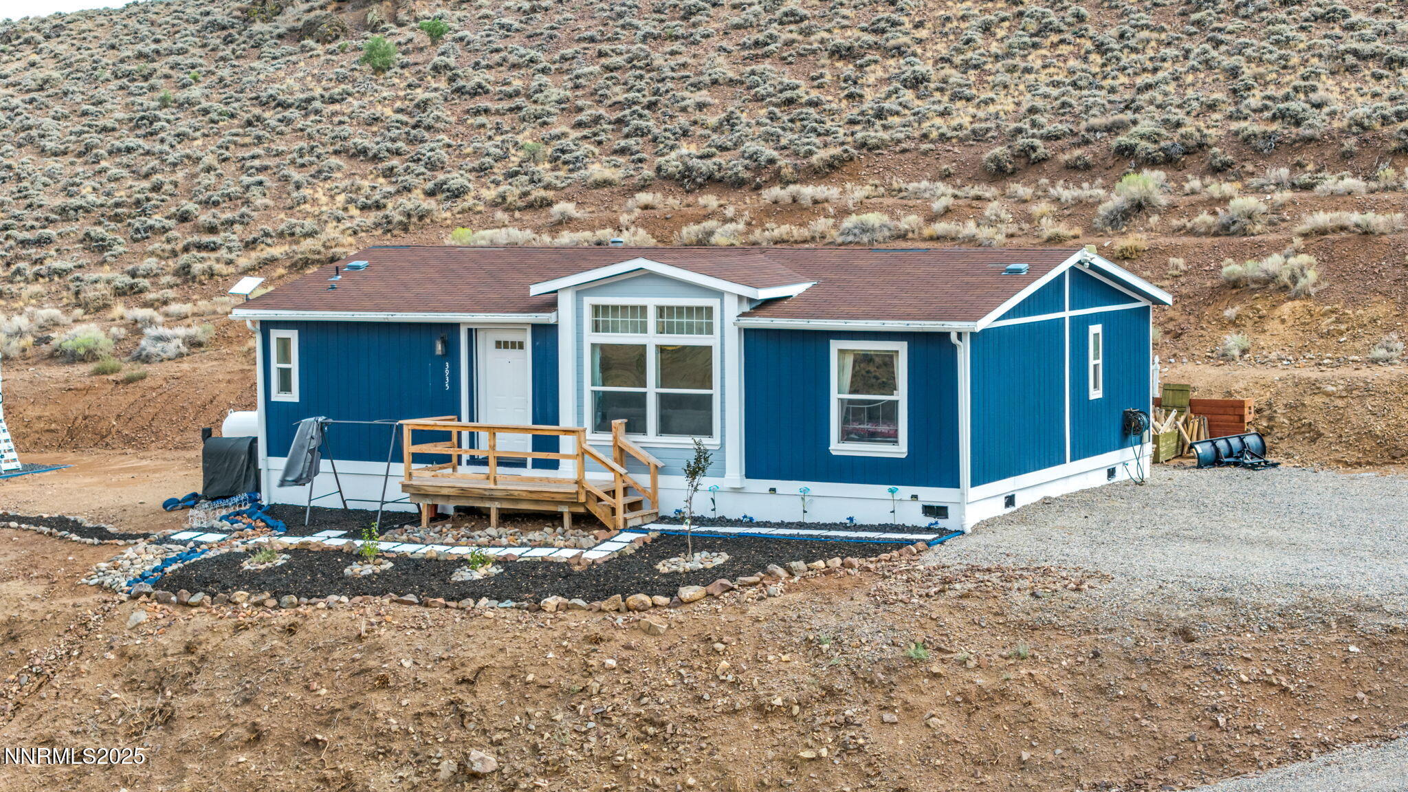 a house view with a garden space