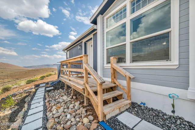 a view of balcony with wooden floor and city view