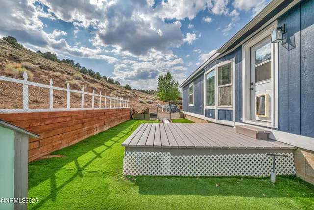 a view of a backyard with a garden