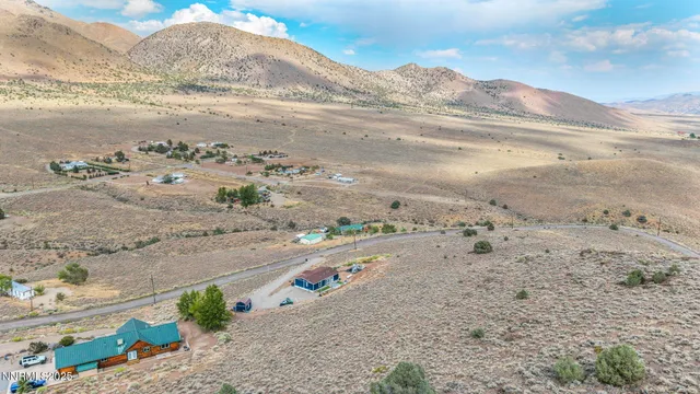 a view of beach and mountain