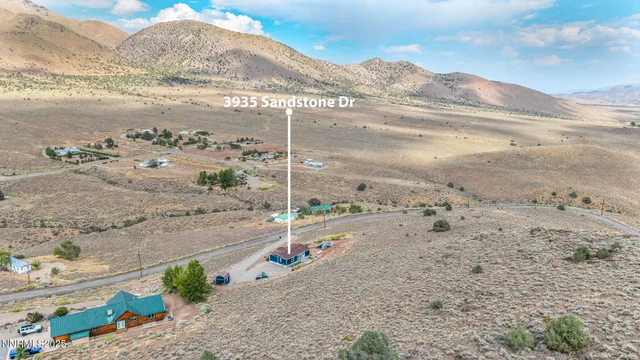 a view of a beach with a road