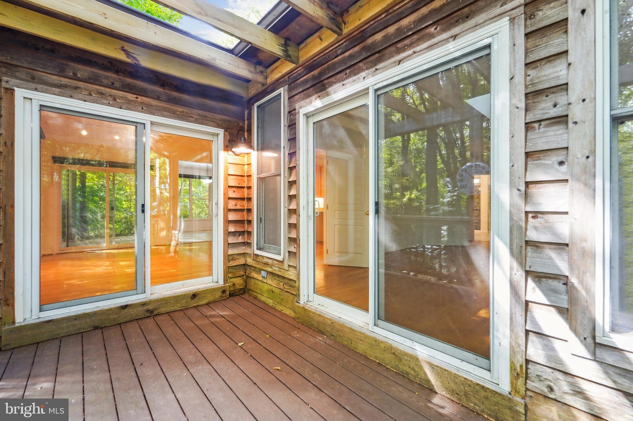 5941 Cherry Hill Road Huntingtown, MD 20639 - Photo 36 of 42 Sliding glass doors to maintenance free-decks!