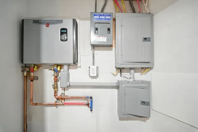 a bathroom with mirror sink