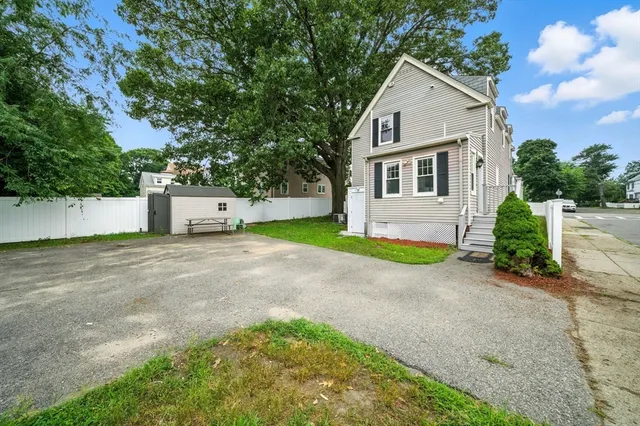 a house view with a garden space