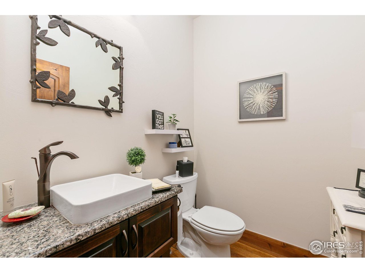 6701 Clovis Court Timnath, CO 80547 - Photo 12 of 40 a bathroom with a sink and a toilet