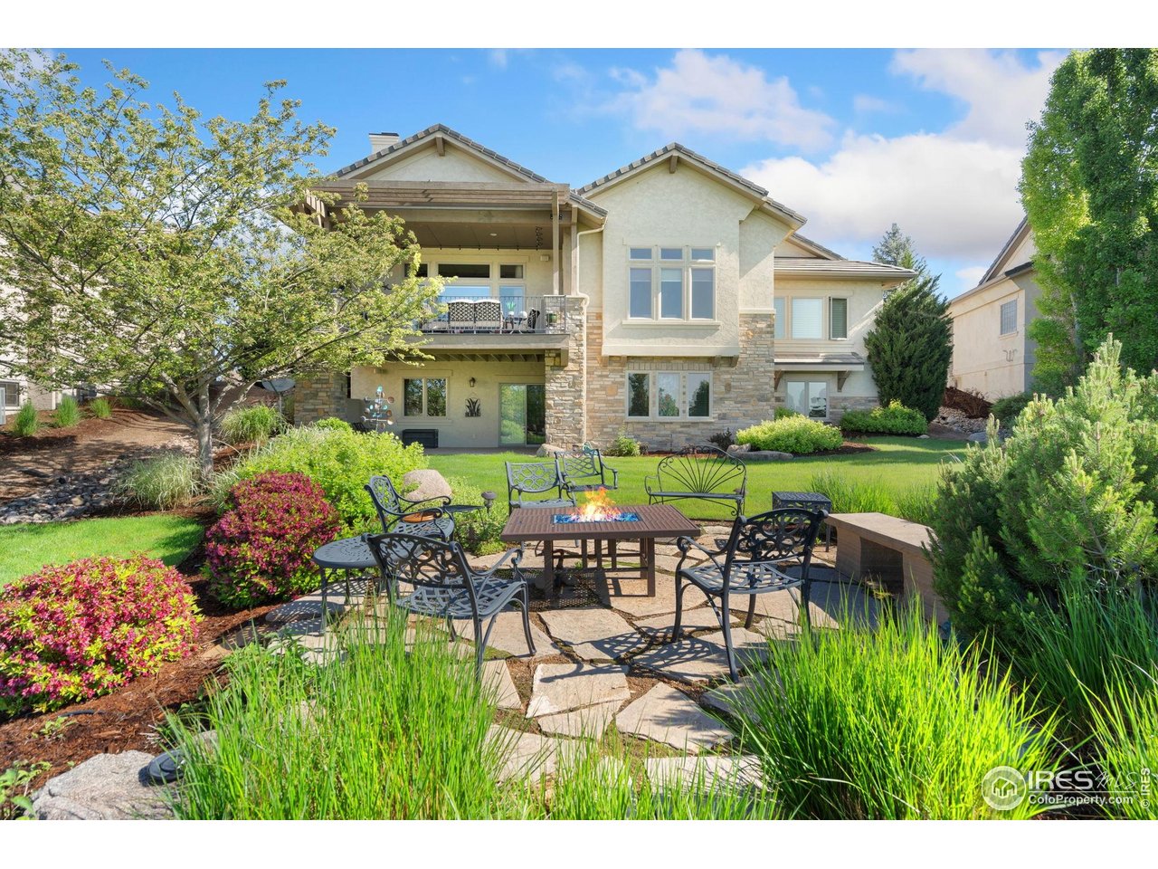 6701 Clovis Court Timnath, CO 80547 - Photo 24 of 40 a view of a house with a yard and sitting area