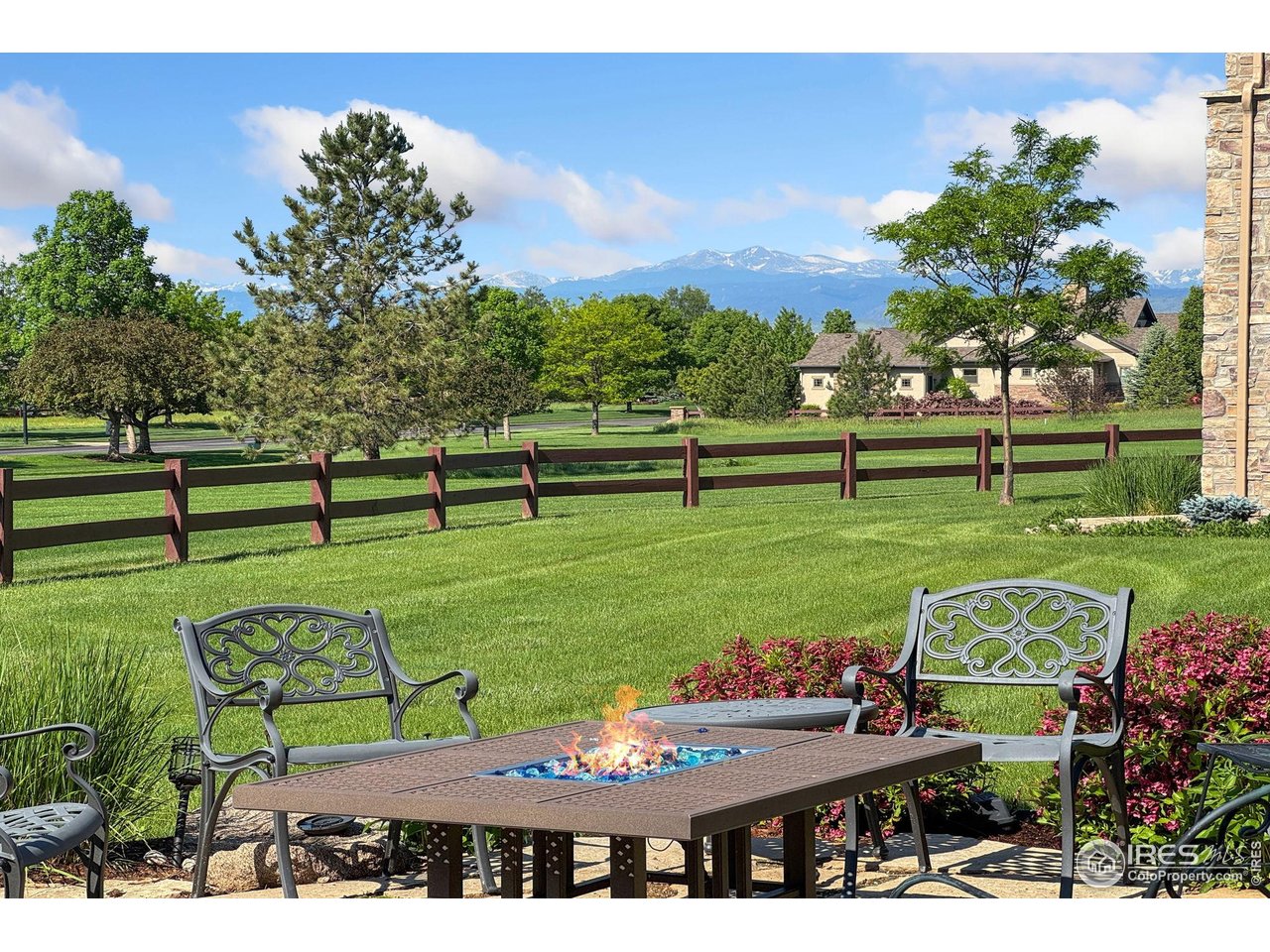 6701 Clovis Court Timnath, CO 80547 - Photo 25 of 40 a view of a table and chairs in the garden